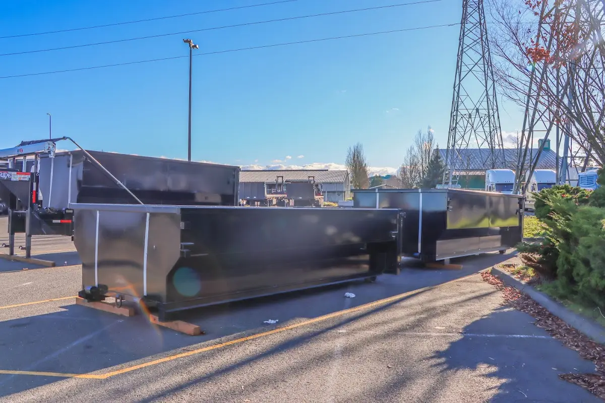 Roll-off dumpster ready for waste disposal at job site for 6 Yard Dumpster Rental in Lanett
